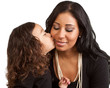 Young girl kisses her mother Young girl kisses her mother