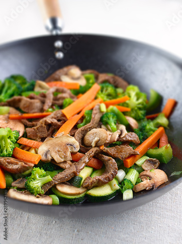 Photo: colorful stirfry in a wok colorful stirfry in a wok