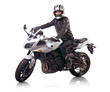 Photo: Biker in black leather jacket rides a white motorcycle Biker in black leather jacket rides a white motorcycle