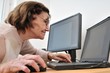 Never old enough - senior woman with computer Never old enough - senior woman with computer