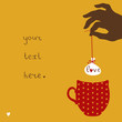 Cup of love. Hand silhouette holding teabag Cup of love. Hand silhouette holding teabag