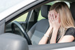 In troubles - unhappy woman in car In troubles - unhappy woman in car