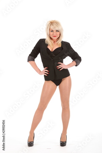 Photo: Sexy blonde girl in leotard and heels with hands on hips Sexy blonde girl in leotard and heels with hands on hips