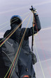 The glider pilot prepares for flight on a paraplane