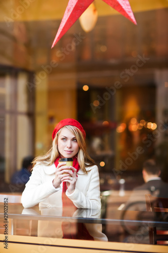 Photo: Woman drinking coffee Woman drinking coffee