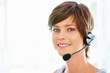 Woman with headphones looking at you