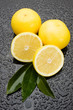 Fresh grape fruit on wet surface