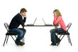 Teenage students using laptops on white background in studio
