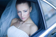 Foto: bride in a car bride in a car