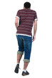 Young man dancing. Rear view.