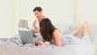 Beautiful couple on their bed