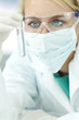 Female Scientist or Doctor With Test Tube In Laboratory