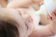 Photo: baby,kleinkind mit Fläschchen baby,kleinkind mit Fläschchen