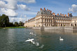 Medieval royal castle Fontainbleau and lake near Paris in France