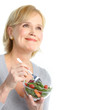 Photo: woman eating salad woman eating salad