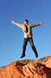 Foto: Happy businessman jumping Happy businessman jumping