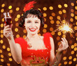 Lady in red dress at the carnival with champagne flute Lady in red dress at the carnival with champagne flute