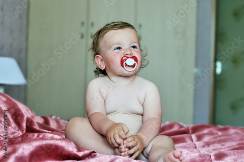 Photo: funny baby girl with soother funny baby girl with soother
