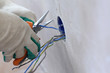 worker puts the wires