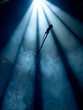 Photo en ligne au meilleur prix Microphone on stage with stage-lights in the background