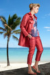beautiful woman with red dress at maldives island