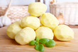 Potatoes on wooden board