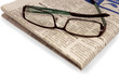 Glasses on a newspaper