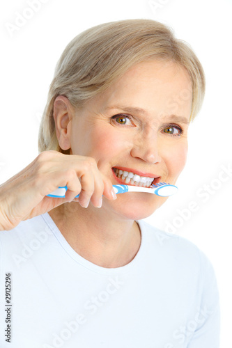 Photo: Woman with a toothbrush Woman with a toothbrush
