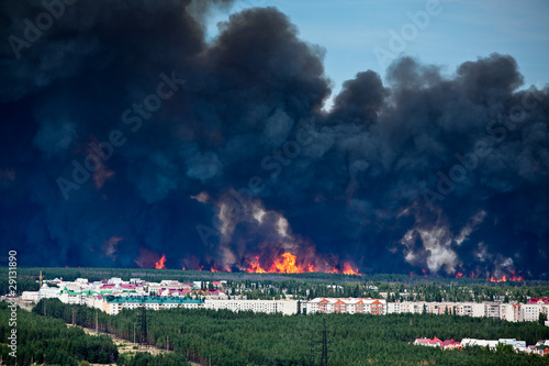 Photo: Fire near to apartment houses Fire near to apartment houses