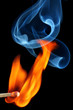 Burning matchstick with smoke