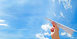 Throwing a paper plane in the sky. Freedom, future. Throwing a paper plane in the sky. Freedom, future.