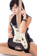 a beautiful young woman with electo guitar