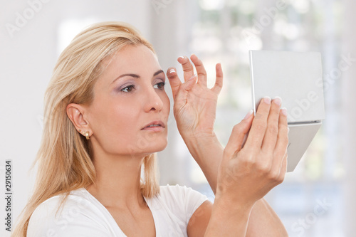 Photo: Beauty woman making-up Beauty woman making-up