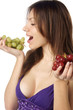 woman with grape on white background