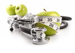 Green apples with stethoscope against white Green apples with stethoscope against white