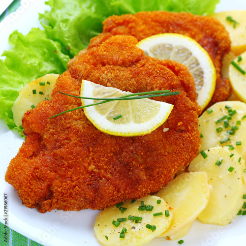 Photo: Wiener Schnitzel with potato salad Wiener Schnitzel with potato salad