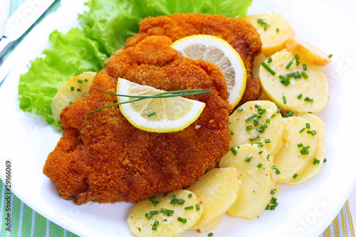 Photo: Wiener Schnitzel with potato salad Wiener Schnitzel with potato salad