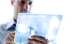 Young businessman check soething on the touchscreen.