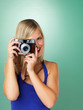 Pretty woman photographer taking photo Pretty woman photographer taking photo