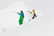Schifahrer und Snowboarder