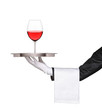 Hand holding a silver tray with a glass of wine on it