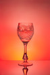 Wine glass on red background Wine glass on red background
