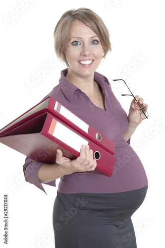 Photo: young pregnant business woman at work young pregnant business woman at work