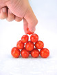 Plum tomatoes on white background.