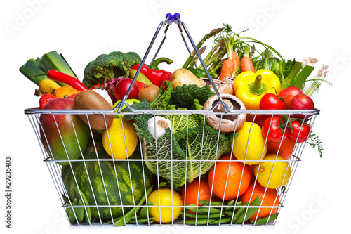 Photo: Shopping basket fruit and vegetables isolated on white Shopping basket fruit and vegetables isolated on white