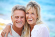 Happy mature couple outdoors.
