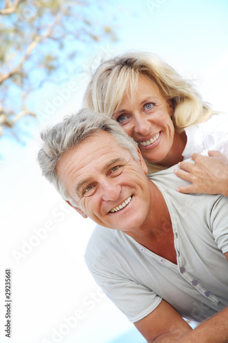 Photo : Happy mature couple outdoors. Happy mature couple outdoors.