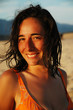 Beautiful smiling girl on a beach