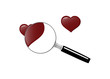 Magnifying glass with hearts, symbolizing the search for love