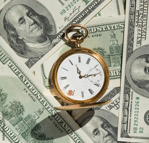 Photo: Time and Money concept image. Time and Money concept image.